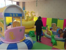 Kids play with friend in Indoors playground Kids play with friend in Indoors playground